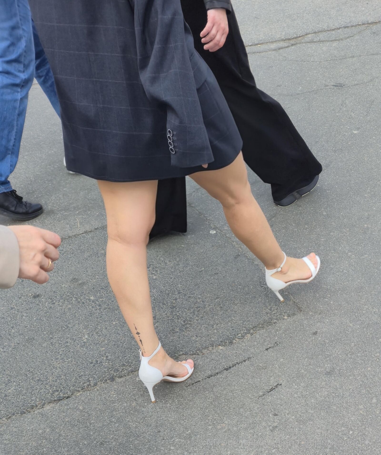 Girl in white sandal heels