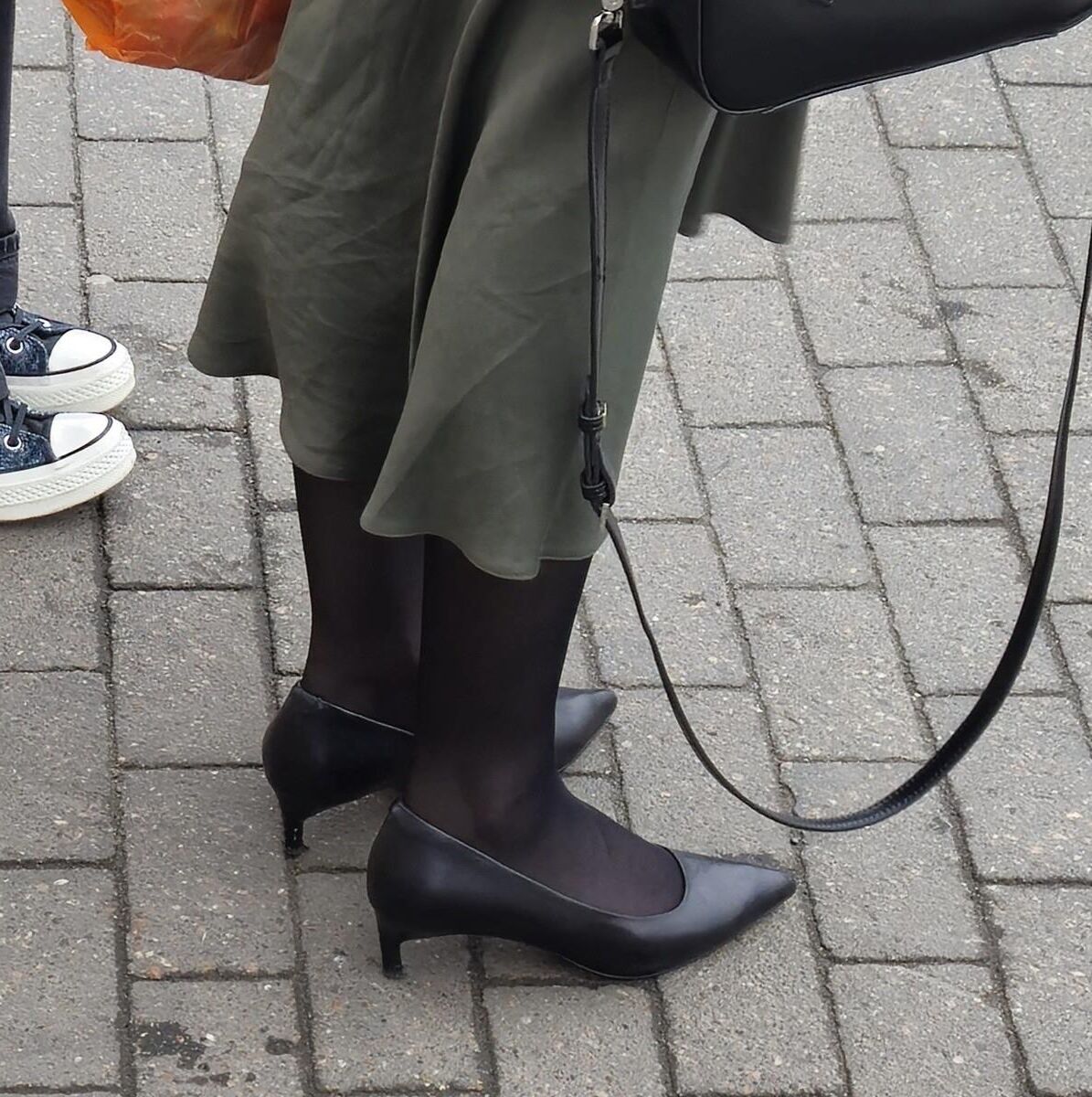 Woman in long skirt and heels