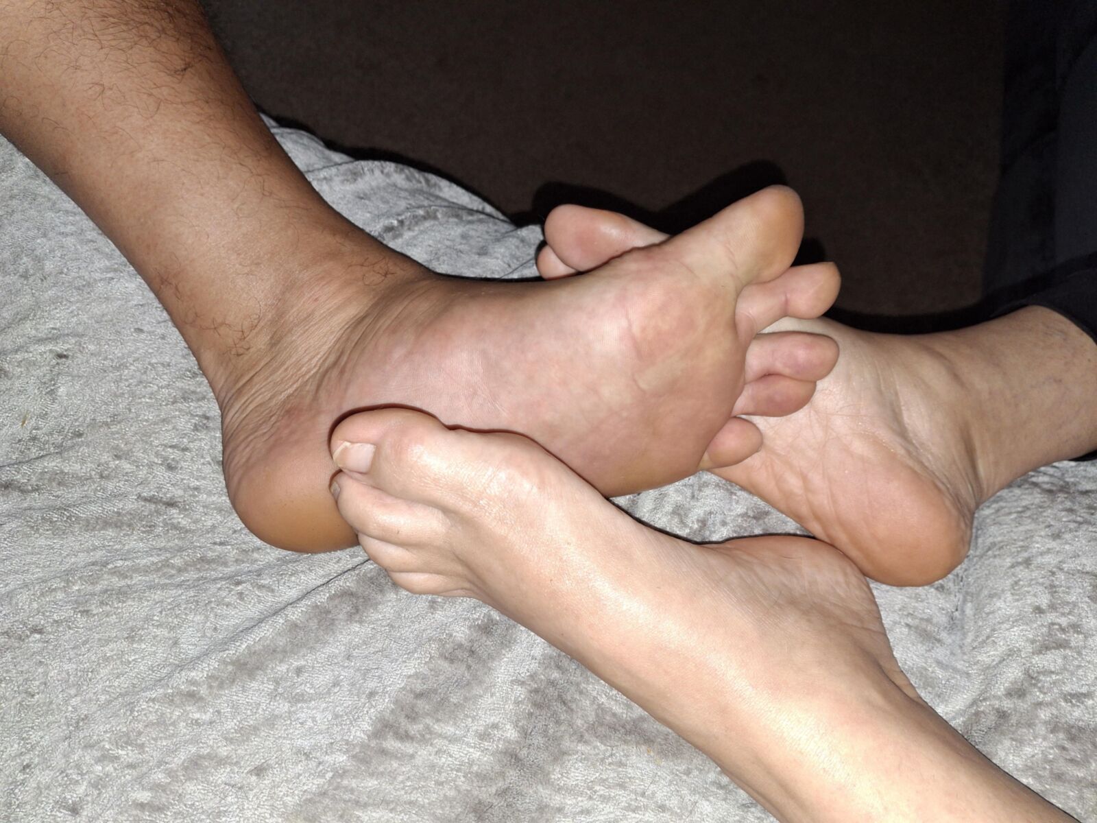 Playing Footsie barefoot with my girlfriend