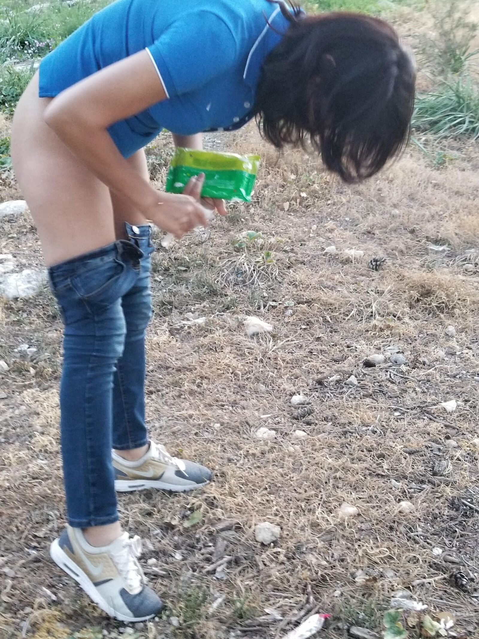Yana pees in the forest