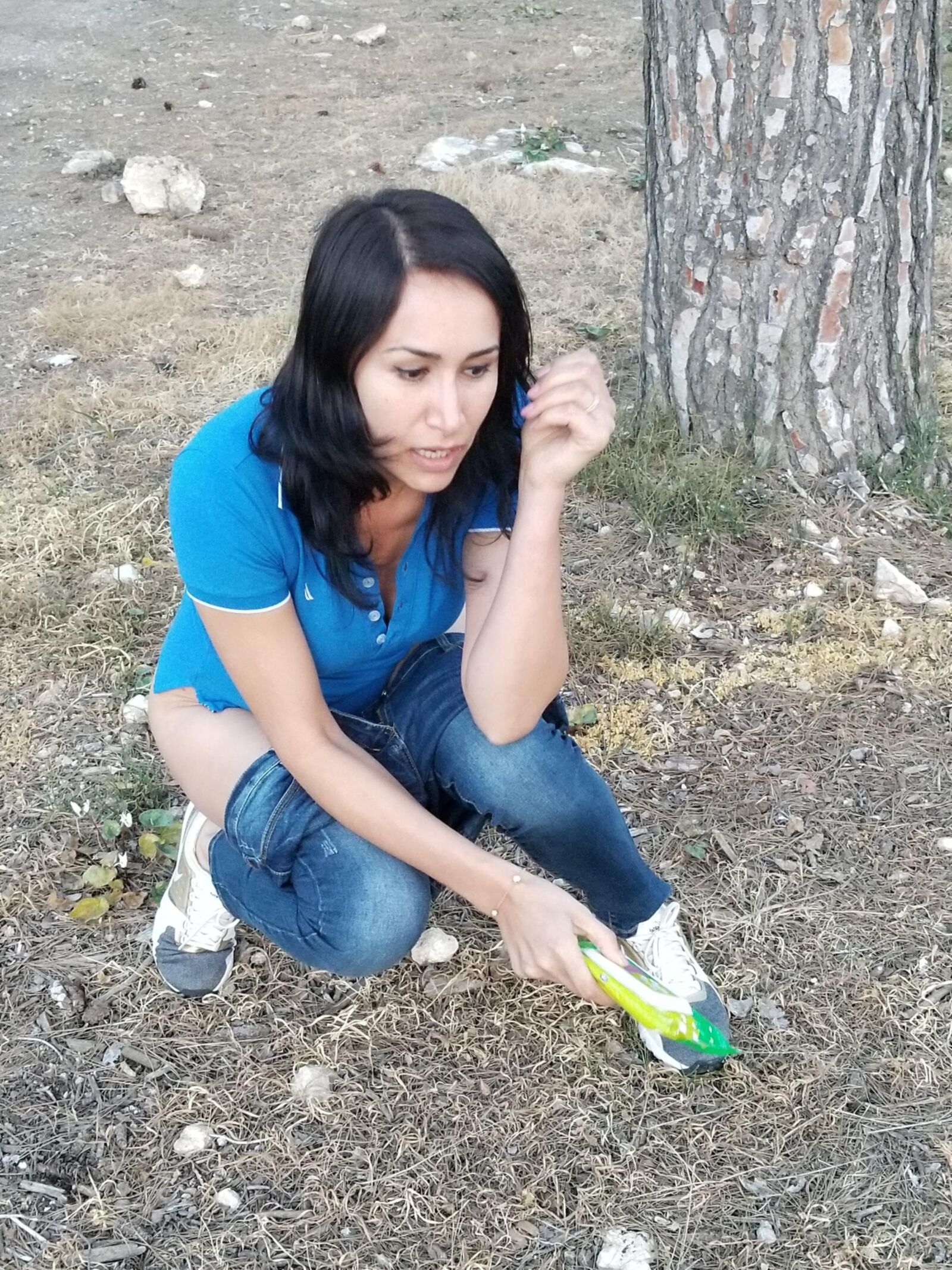 Yana pees in the forest