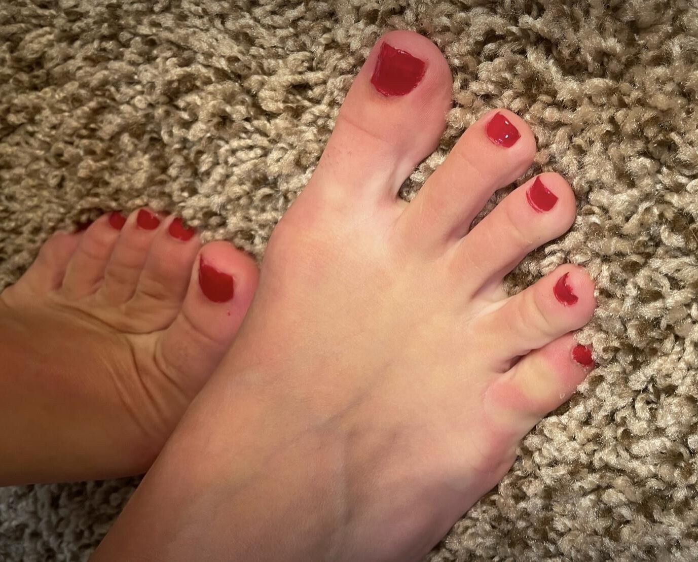 Kristin showing her feet in heels and jeans