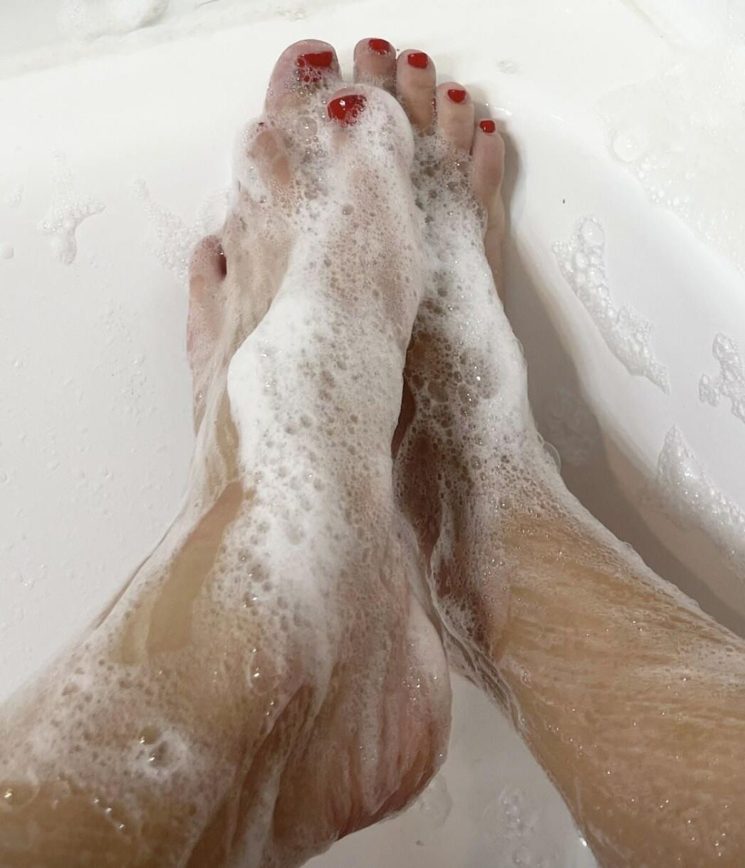 Kristin’s perfect, sexy, soapy red toes and hot soles