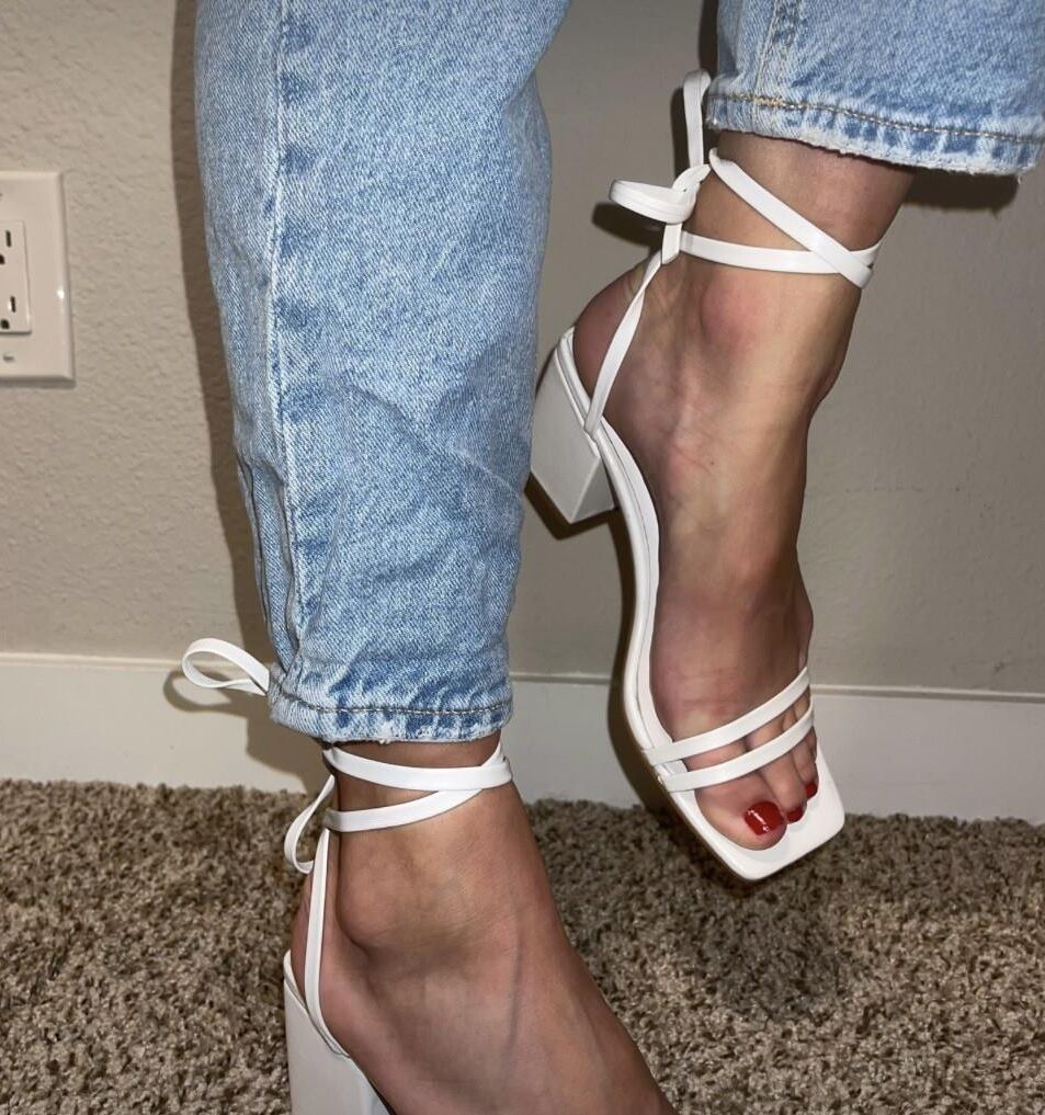 Kristin showing her feet in heels and jeans