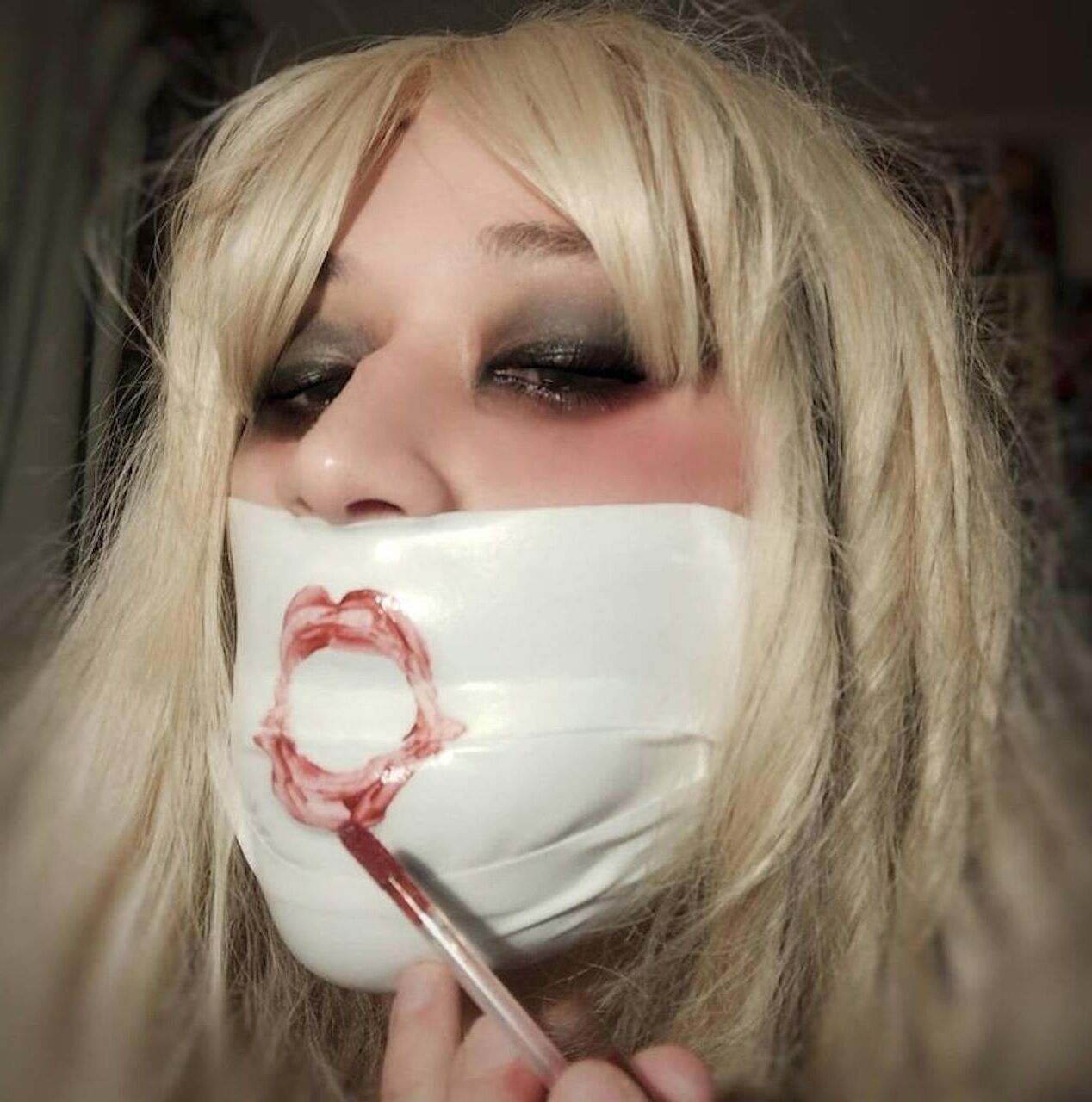 Gagged faces 