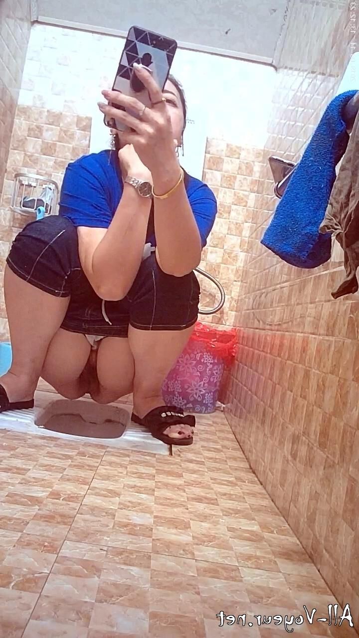 Bathroom Shot Panoramic shot of a young lady pissing 