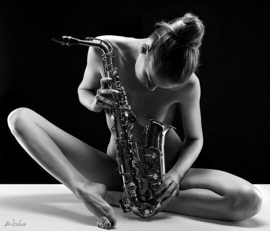 Music is nude, sensual women playing an instrument ()
