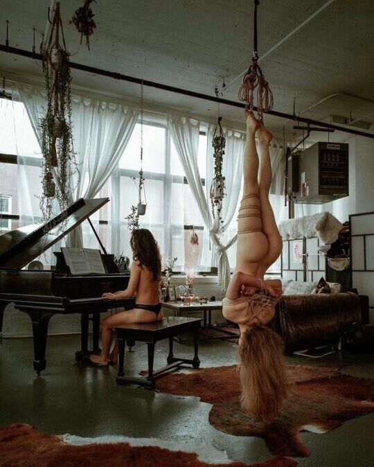 Music is nude, sensual women playing an instrument ()