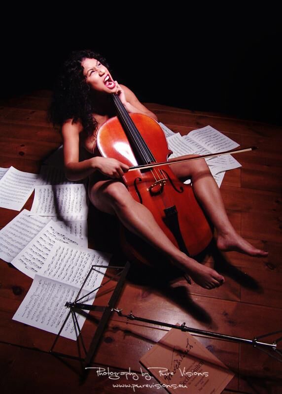 Music is nude, sensual women playing an instrument ()