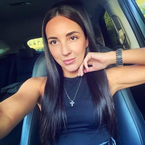 Black sleeveless tops and metal wristwatches #