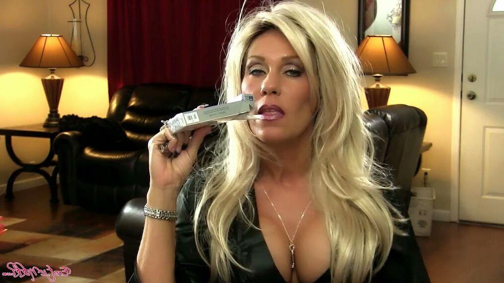 Busty MILF Smokes