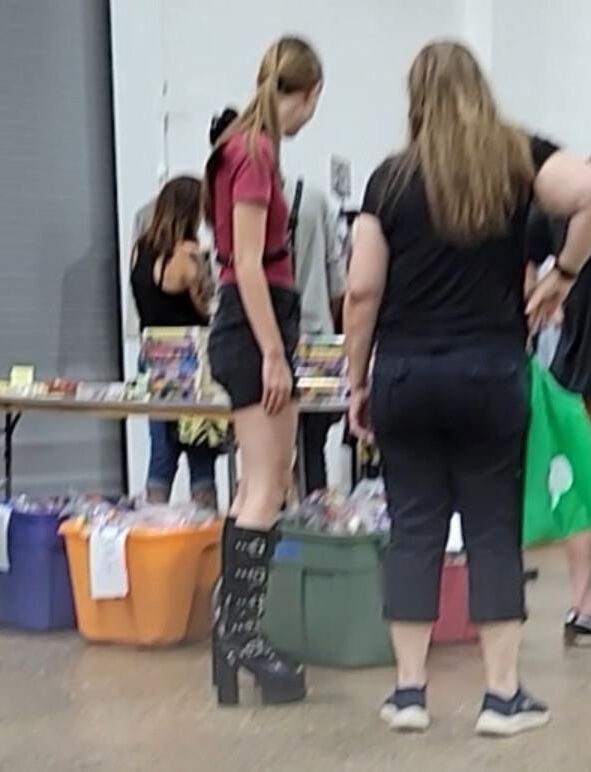 Public slut wears leather hooker boots and BDSM gear (CANDID)