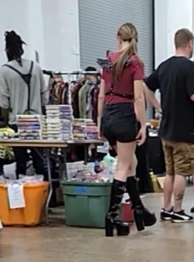 Public slut wears leather hooker boots and BDSM gear (CANDID)