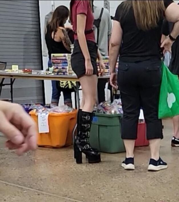 Public slut wears leather hooker boots and BDSM gear (CANDID)