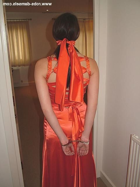 Manda Marie Bound in Orange Satin Dress