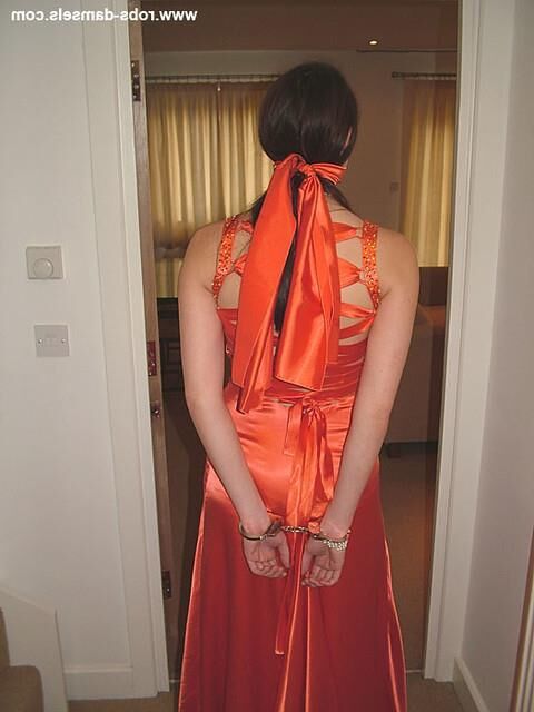 Manda Marie Bound in Orange Satin Dress