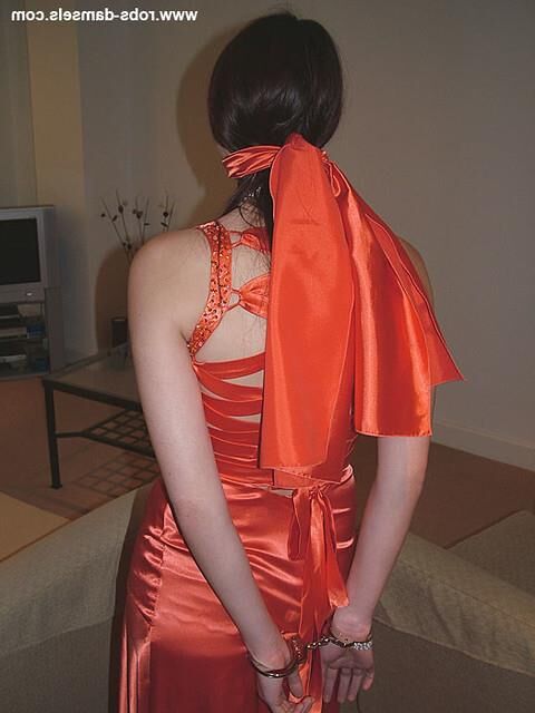 Manda Marie Bound in Orange Satin Dress