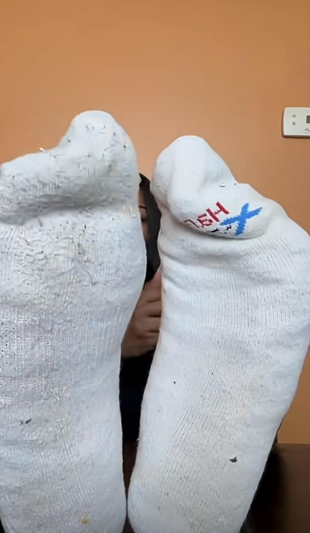 P Black bitch exposes her sweaty socked soles for you